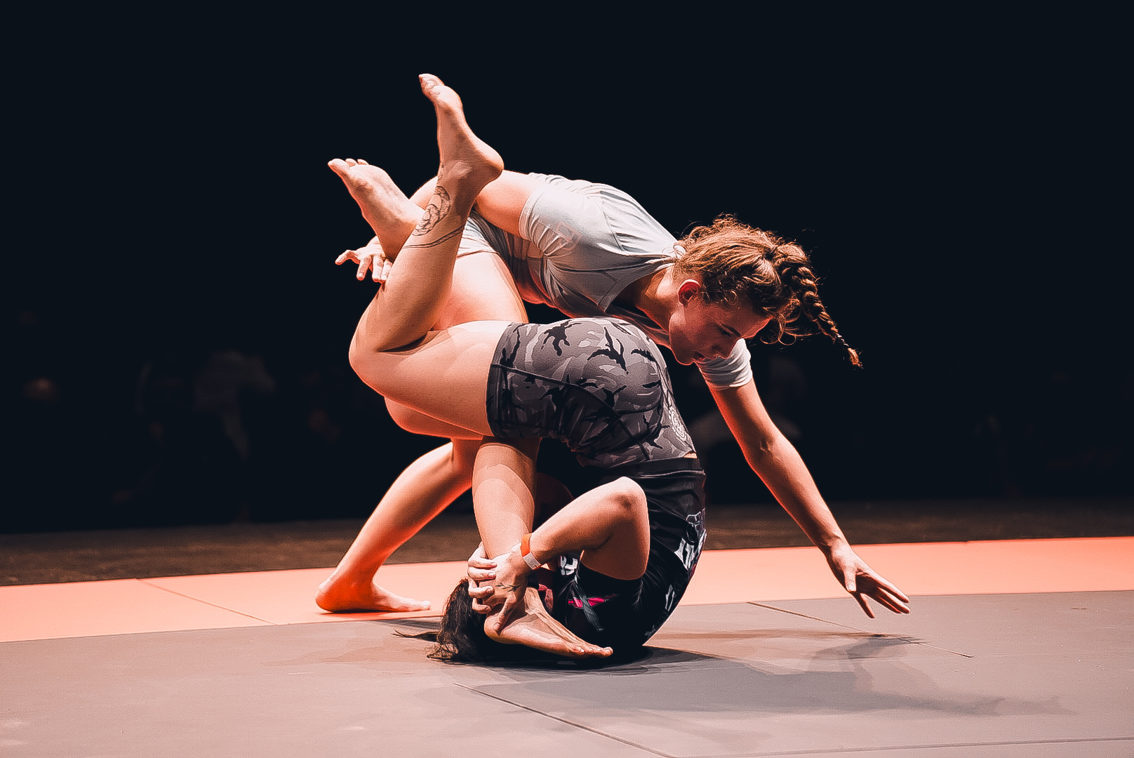 Women's match with a dynamic scramble on the GrappleMax mat